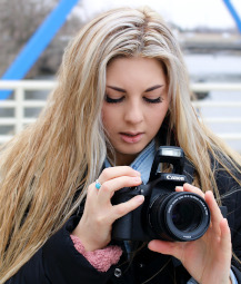 me holding a camera small