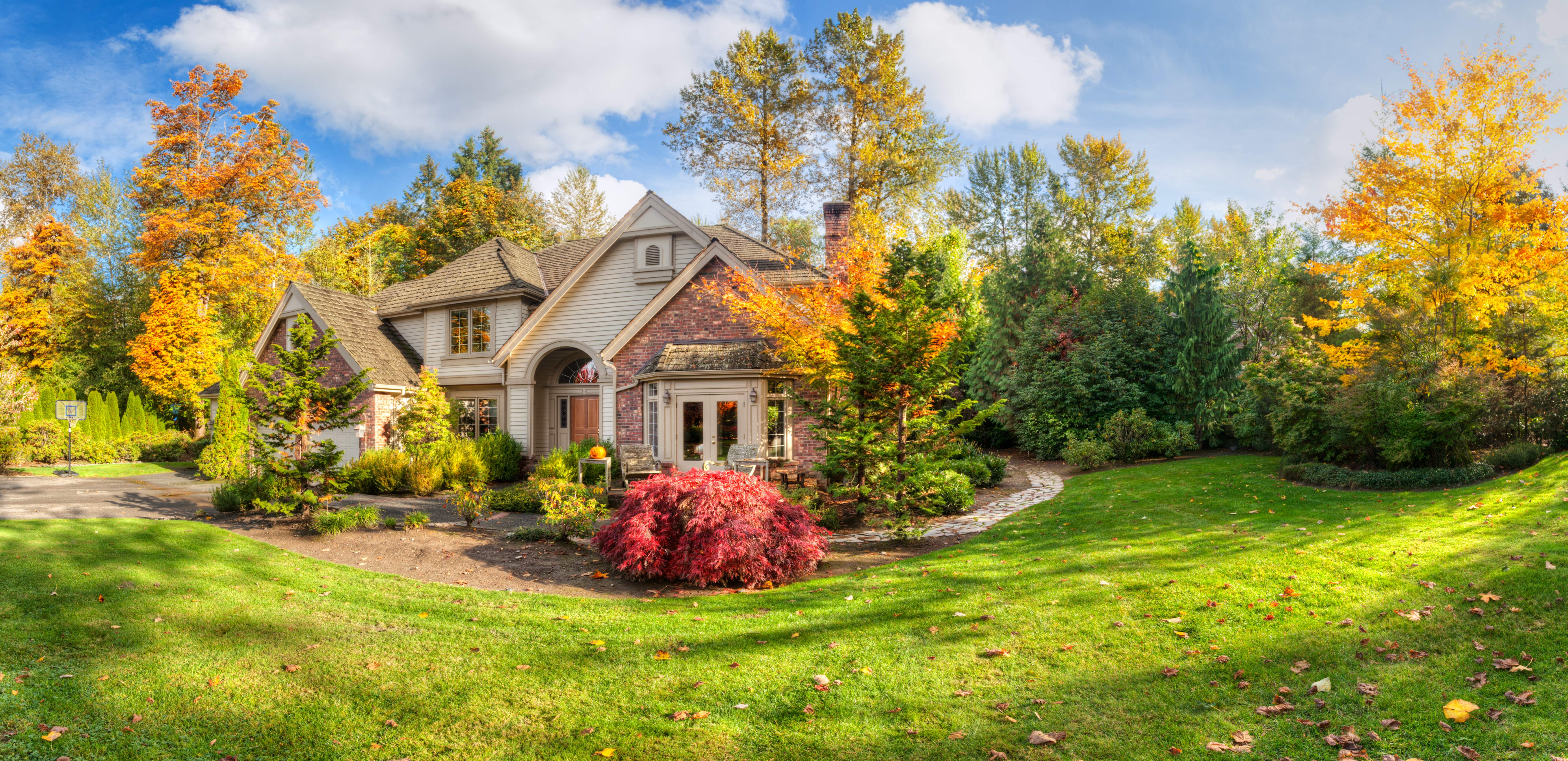 Beautiful home with yard in the Fall season